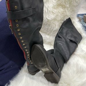 Edgy steampunk knee high boots. Very unique and very comfortable.